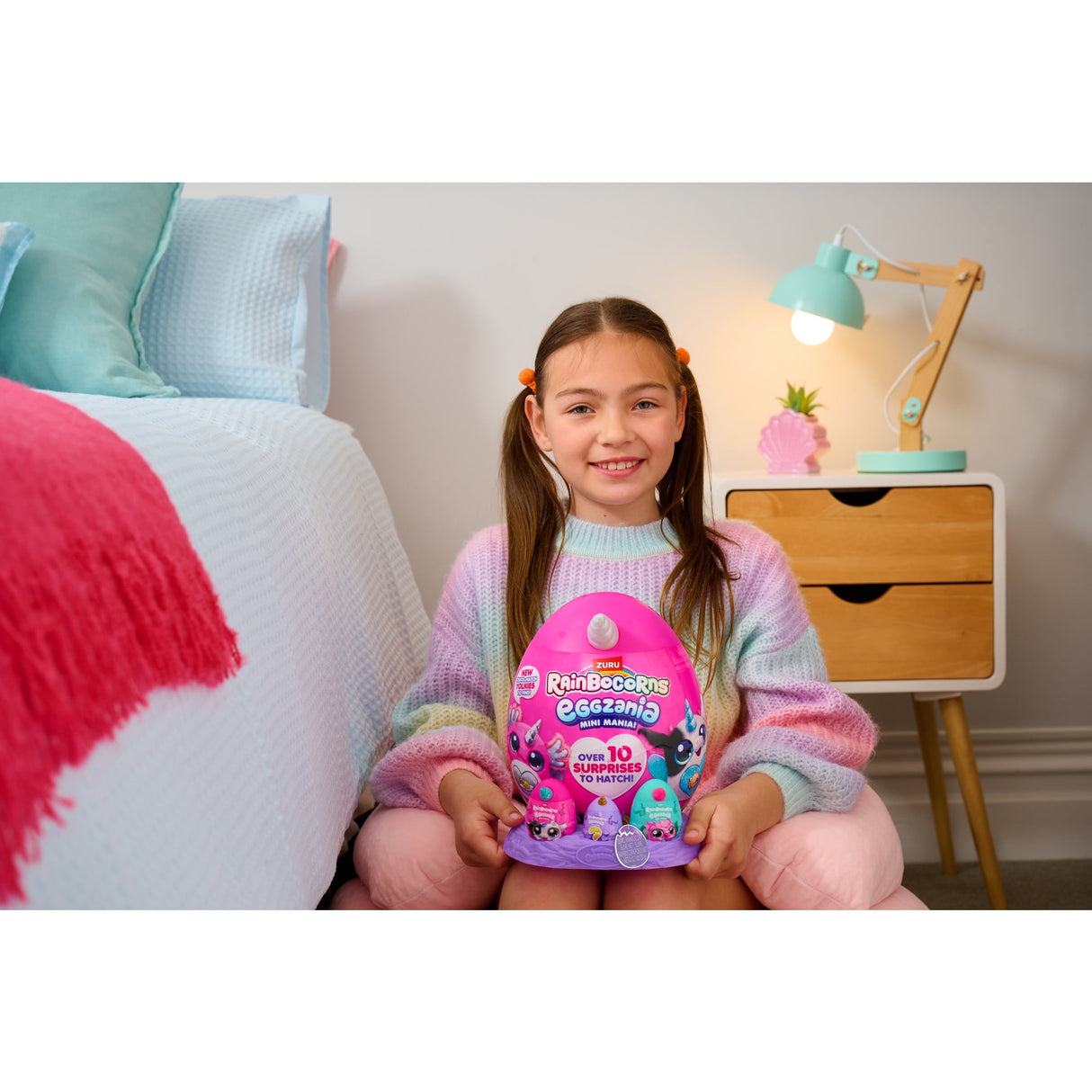 Rainbocorns Eggzania Mini Mania - Pocket-Sized Plush Egg with 10+ Surprises, Yolkies, and Bracelet Accessories - Assorted