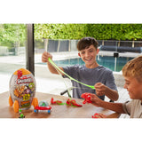 Smashers Dino vs Aliens Rocket Egg - Buildable T-Rex Dino with Slime, Sand, and 20+ Intergalactic Surprises - Assorted