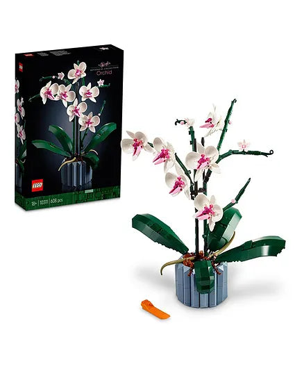 Set the main image alt text to: "LEGO Botanicals Orchid 10311 building kit with white and pink flowers, leaves, air roots, and blue fluted vase"