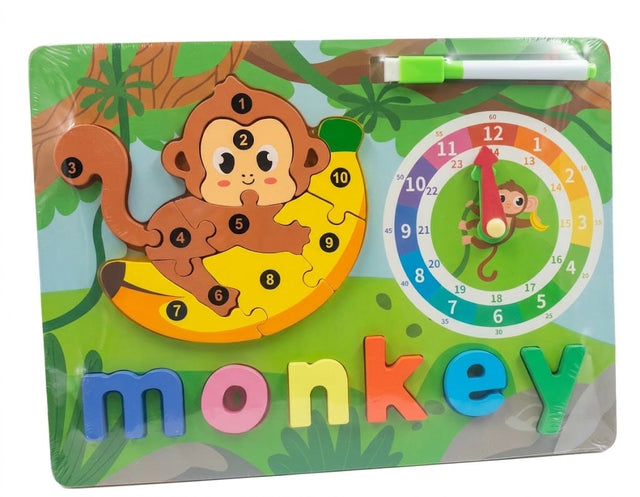 A colorful children's educational toy board featuring a monkey puzzle, a rainbow clock, and the word 'monkey' in movable letters, with a green marker at the top.
